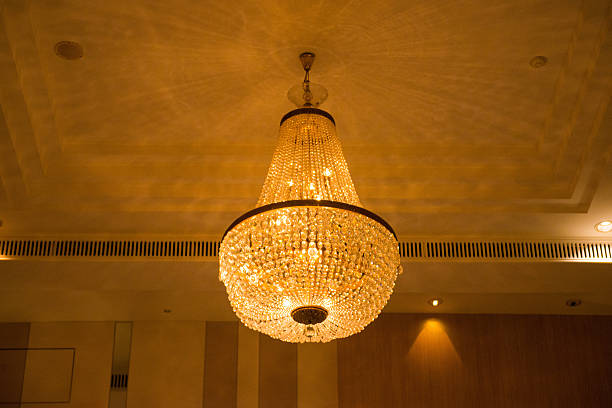istock ceiling crystal chandelier in luxury room 630069204