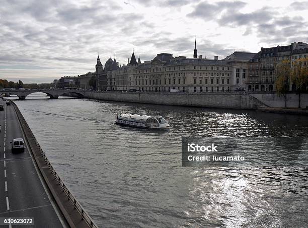 Paris The Conciergierie From Pont Neuf Stock Photo - Download Image Now - Apartment, Autumn, Boat Deck
