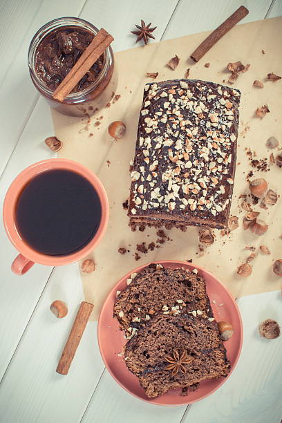 istock Dark cake with chocolate, cocoa and plum jam, coffee 630958698