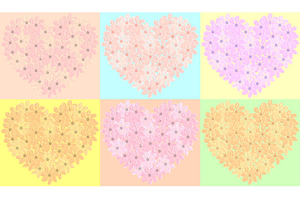 A macro image of a group of bleeding heart flowers.