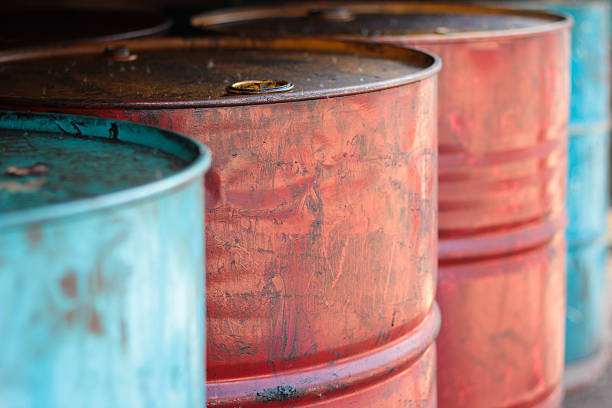 istock Old oil tanks background 630959540