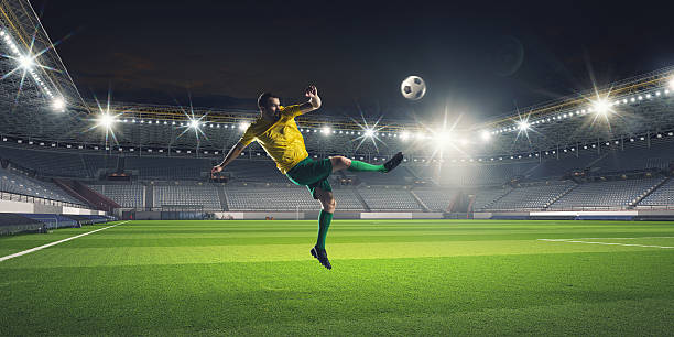 istock Soccer player kicking ball . Mixed media 630960498