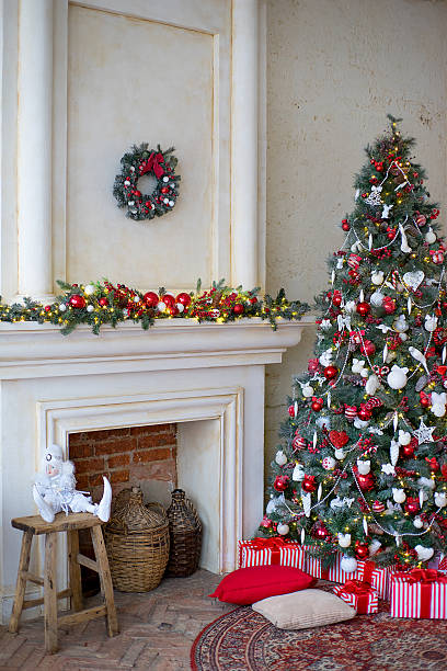 istock Stylish Christmas interior decorated in white and red colors 631185546
