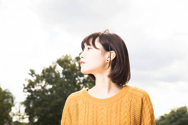 istock Beautiful woman in nature 631185672