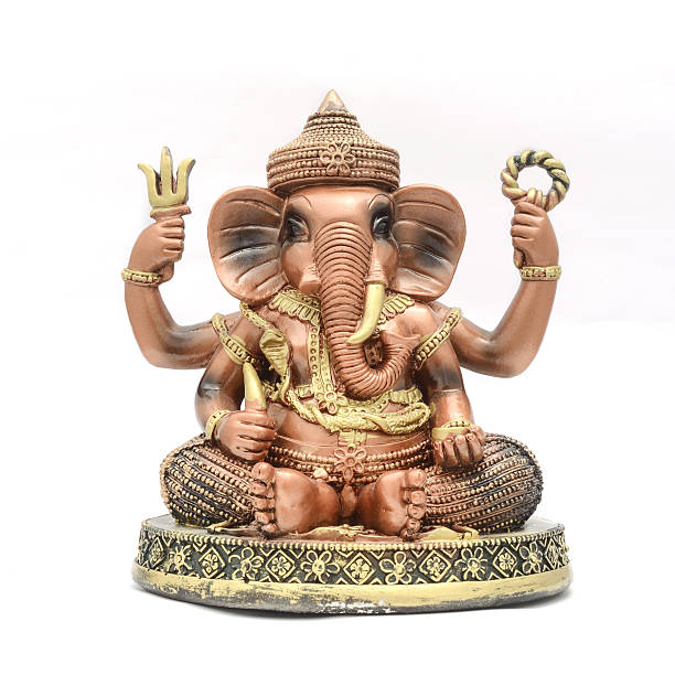 istock Ganesha figurine isolated on white 631933860
