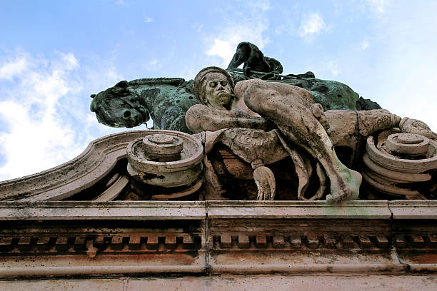 istock Sculptures detail in Budapest with background sky 631934702