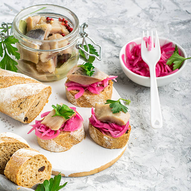 istock Finger snack. Mini open sandwiches with sweet pickled red onion 632215822