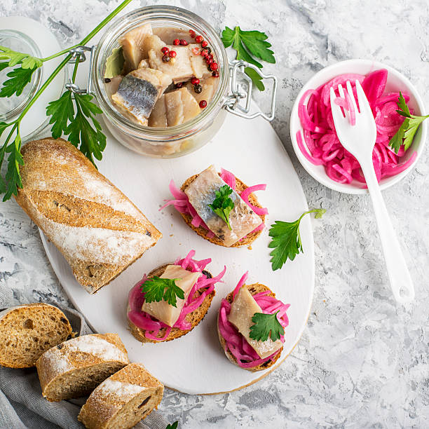 istock Finger snack. Mini open sandwiches with sweet pickled red onion 632215958