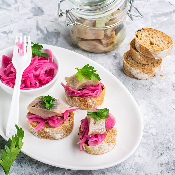 istock Finger snack. Mini open sandwiches with sweet pickled red onion 632216120