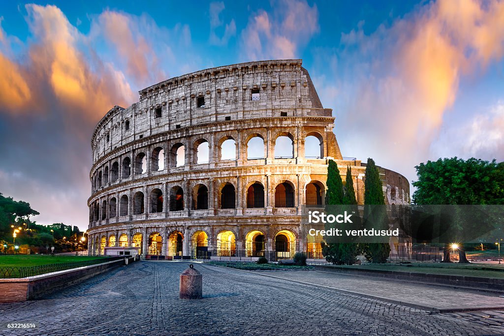 Colosseum in Rome at dusk, Italy Colosseum in Rome at sunset with lights, Italy Rome - Italy Stock Photo