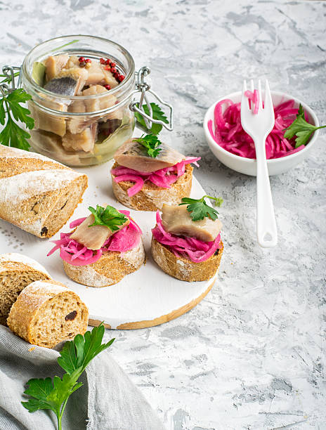 istock Finger snack. Mini open sandwiches with sweet pickled red onion 632216646