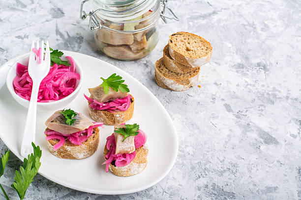 istock Finger snack. Mini open sandwiches with sweet pickled red onion 632217114