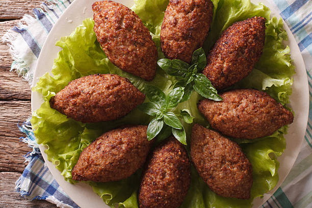 istock Arabic Kubbeh tasty meatballs close up on a plate. horizontal 632219538