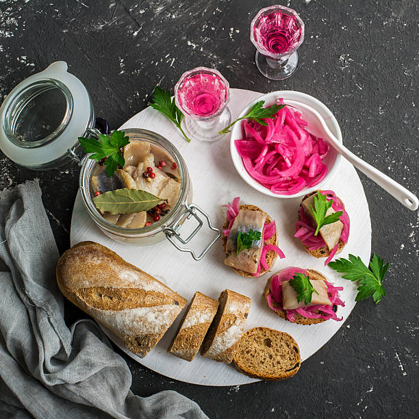 istock Small sandwiches for aperitif with marinated sweet onion and salt 632439862