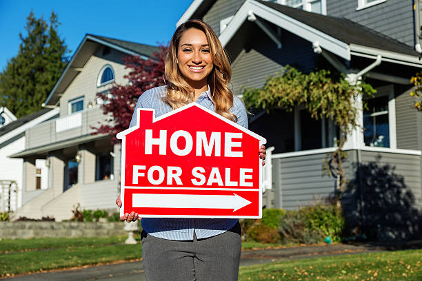 istock Attractive Young Hispanic Real Estate Agent 632441130