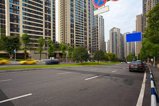 istock Empty road surface floor with City streetscape buildings 632441560