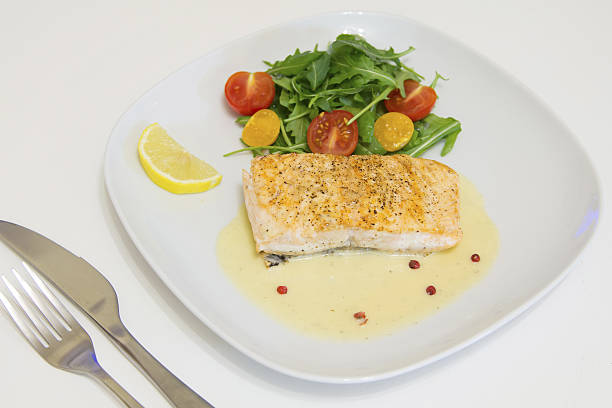 istock Grilled salmon steak with beurre blanc sauce 632445426