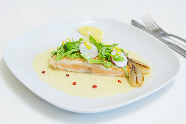 istock Grilled salmon steak with beurre blanc sauce 632445552