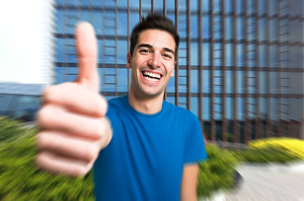 istock Happy man giving thumbs up 633113916