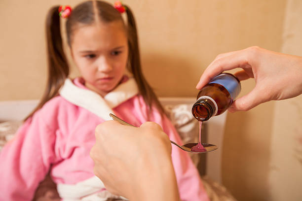 istock Little girl is going to take medicine. 634573884