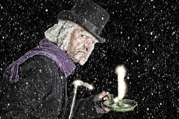 istock Man dressed as Scrooge lookalike 634574028