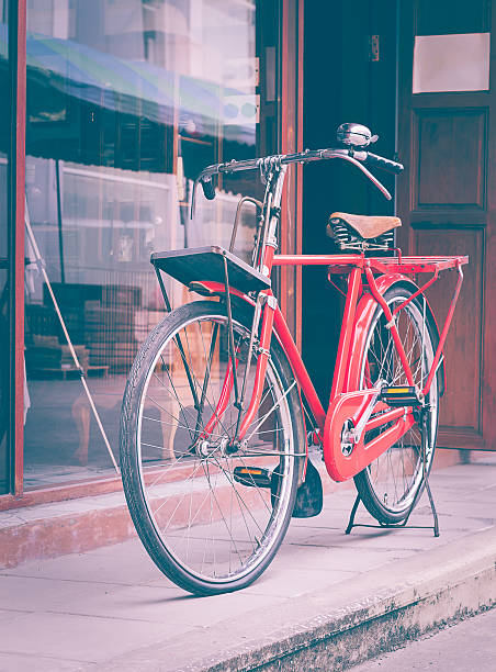 istock Red bicycle standing on street 634574574