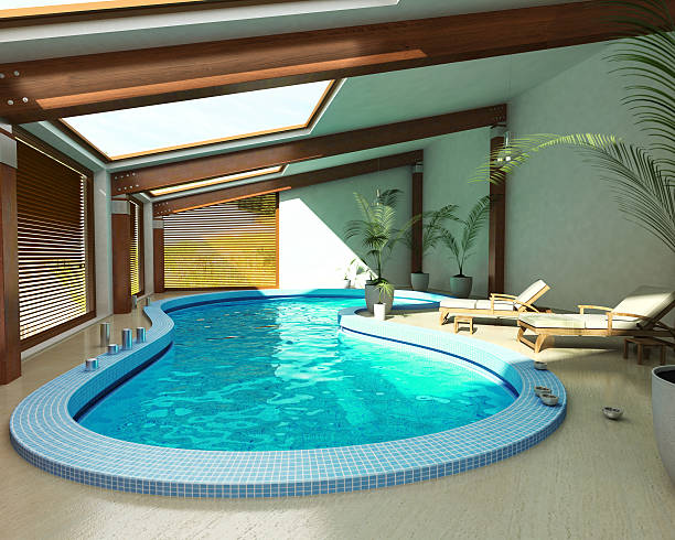 istock Indoor spa pool with chairs and plants. 635474850