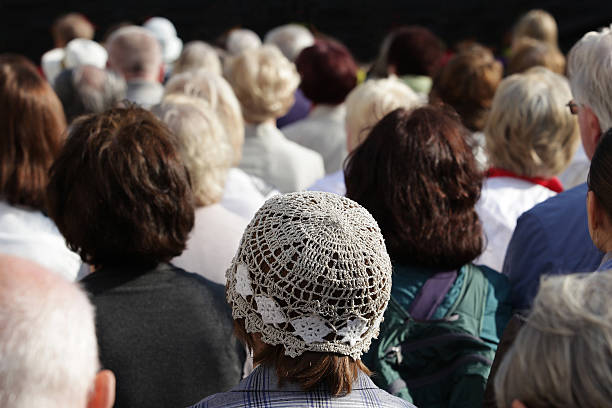 istock Crowd of people watching something. 635475138