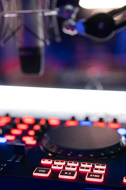 istock DJ equipment at night club 635672082