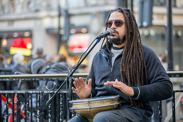 istock Street singer with jembe. 635672230