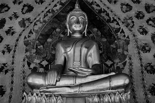 Bangkok, THAILAND - November 21, 2016 : Buddha's statue in Wat Arun temple which is a public place in Bangkok ,Thailand -Black and white effect style pictures . Photo taken on: 21 November , 2016