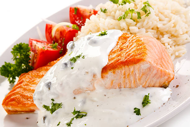 istock Grilled salmon, white rice and vegetables 635674752