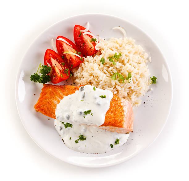 salmone alla griglia, riso bianco e verdure  - herb plant rice white rice foto e immagini stock