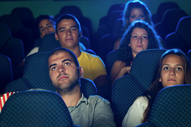 istock People in cinema 635679948