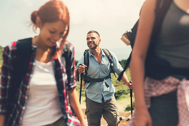 istock Friends hiking in the mountain 635680274