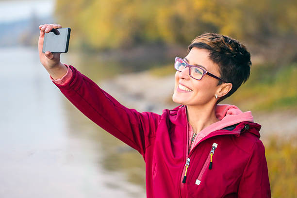 istock Woman taking a selfie 635680876