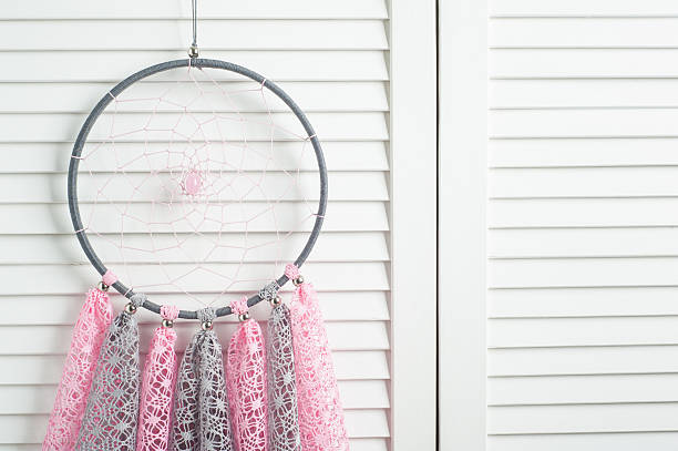 istock Pink grey dream catcher with crocheted doilies 635681280