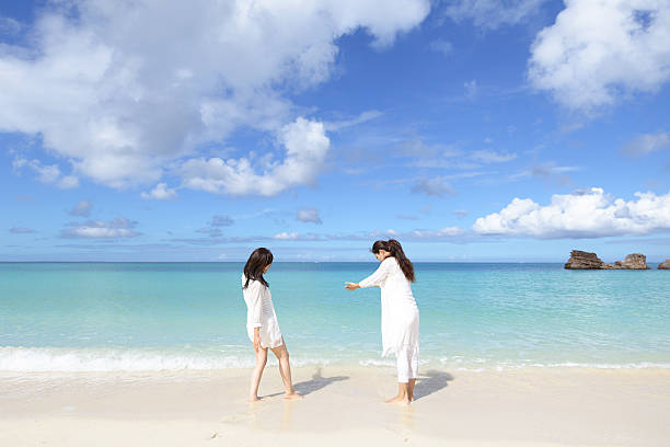 istock Women enjoy the sun. 635682340