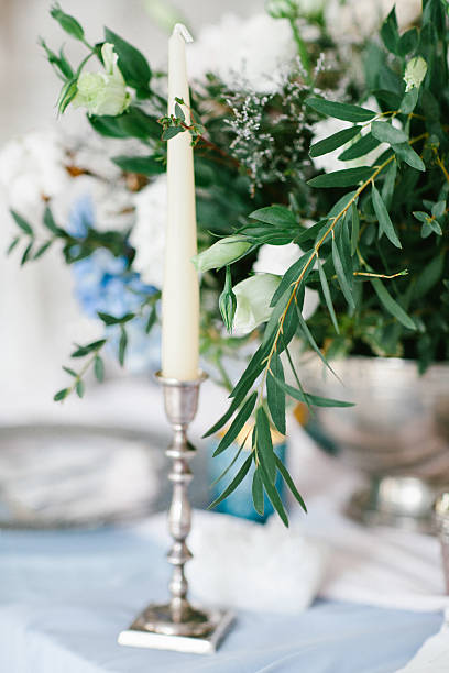 istock Silver candlestick as element of festive table wedding decorations. 635683564
