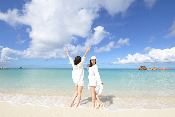 istock Women enjoy the sun. 635685064