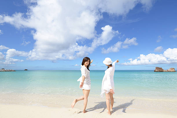 istock Women enjoy the sun. 635685144