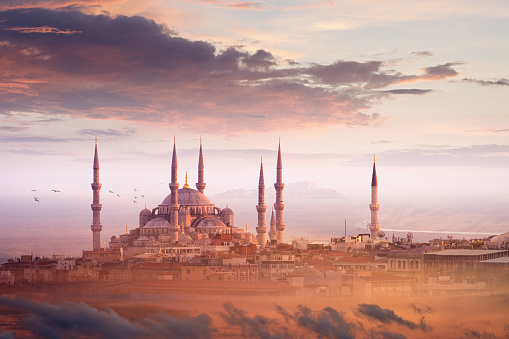 Beautiful sunset in Istanbul, Turkey. Blue Mosque most famous landmark of Istanbul is illuminated by pink sunset light.
