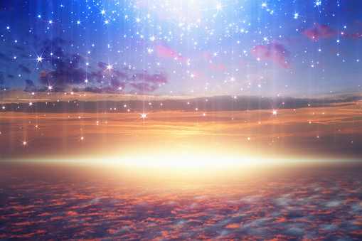 Amazing heavenly background - bright light from heaven, stars fall from skies; glowing horizon, pink clouds