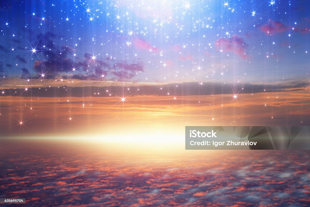 bright light from heaven, stars fall from skies Amazing heavenly background - bright light from heaven, stars fall from skies; glowing horizon, pink clouds Sky Stock Photo