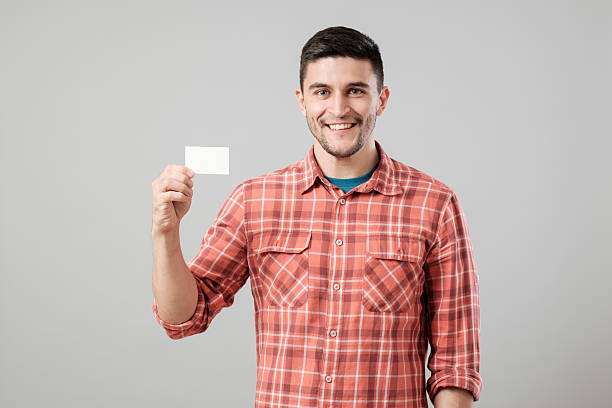 Man showing blank business card