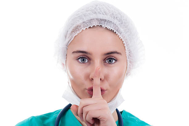 istock Woman Doctor with tablet isolated on white 635698648