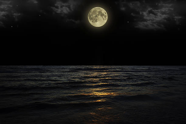 istock Beautiful magic blue night sky with clouds and full moon 635698678