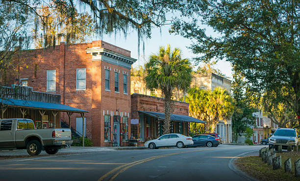 Micanopy, Florida Historic downtown Micanopy, near Gainesville, Florida. rural main street stock pictures, royalty-free photos & images