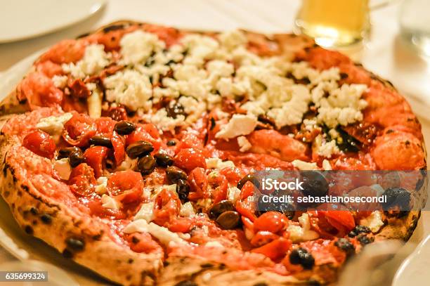 Richly Garnished Pizza Close Up Stock Photo - Download Image Now - Abundance, Baked, Basil