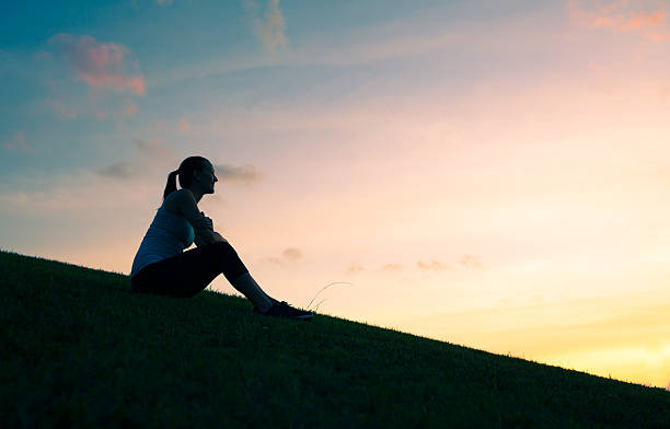 istock Woman sitting and enjoying the view 635699586